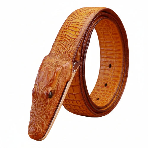 Brown leather belt with crocodile head design on a wooden surface