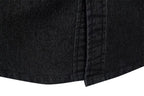 Close-up of black denim fabric with a white background
